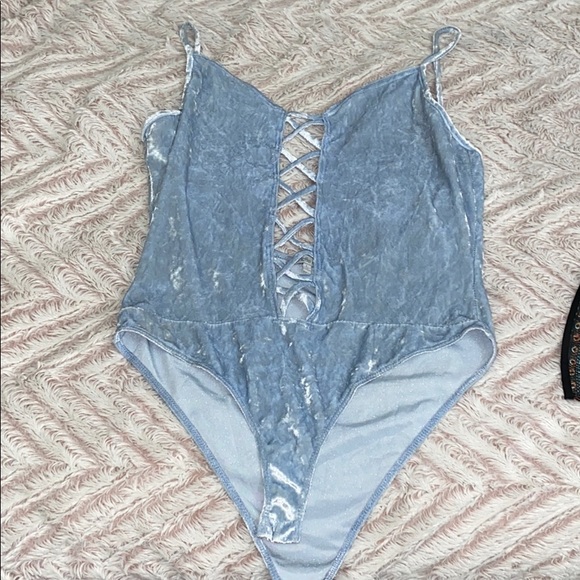 Charlotte Russe Tops - Suede blue bodysuit